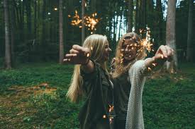 kids running with sparklers