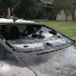 Hail damaged car